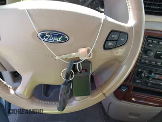 2002 Ford Windstar LTD z VIN 2FMDA58482BB51930, wystawiony jako IAAI lot #41348875 z przebiegiem 92 377 mil mil oraz . Historia ofert i sprzedaży dostępna na DreamBid. Obrazek 11.