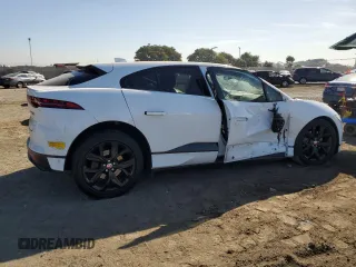 2019 Jaguar I-Pace SE z VIN SADHC2S19K1F68022, wystawiony jako Copart lot #77405114 z przebiegiem Nie podano mil oraz Szkoda całkowita • Salvage title. Historia ofert i sprzedaży dostępna na DreamBid. Obrazek 3.