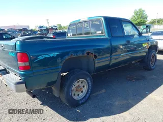1997 Dodge 1500 with VIN 1B7HF13Z0VJ542945, listed as a IAAI auction lot 42100061 with 142,749 mi miles and . Bid and sale history available at carsss.com. Image 4.