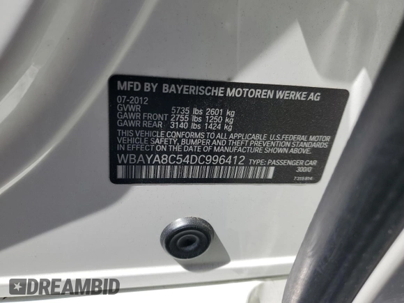 2013 BMW 7 Series 750i with VIN WBAYA8C54DC996412, listed as a Copart auction lot 56982895 with 124,258 mi miles and Salvage title. Bid and sale history available at DreamBid. Image 12.