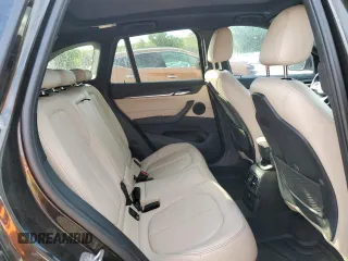 2017 BMW X1 xDrive28i with VIN WBXHT3C32H5F71690, listed as a Copart auction lot 60852375 with 67,475 mi miles and Salvage title. Bid and sale history available at DreamBid. Image 11.