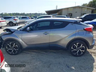 2018 Toyota C-HR XLE with VIN NMTKHMBX1JR026901, listed as a IAAI auction lot 42021943 with 78,217 mi miles and . Bid and sale history available at DreamBid. Image 14.