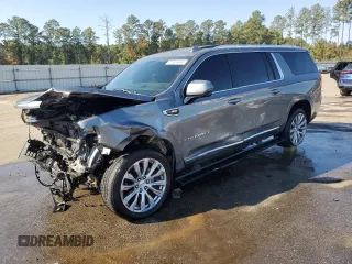 2022 GMC Yukon XL Denali with VIN 1GKS2JKLXNR228983, listed as a Copart auction lot 79202834 with 87,467 mi miles and Salvage Title. Bid and sale history available at carsss.com. Image 1.