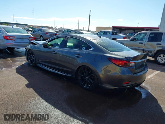 2016 Mazda 6 i Grand Touring with VIN JM1GJ1W57G1479543, listed as a IAAI auction lot 41371653 with 83,741 mi miles and . Bid and sale history available at carsss.com. Image 3.