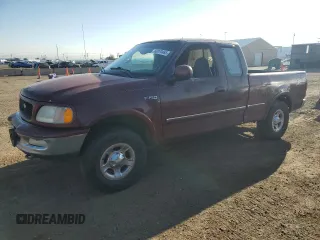 1997 Ford F-150 XL with VIN 1FTEX18L8VKB57633, listed as a Copart auction lot 60070465 with 306,710 mi miles and Salvage title. Bid and sale history available at DreamBid. Image 1.