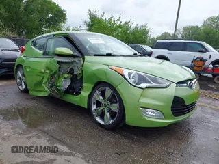 2012 Hyundai Veloster w/Gray Int z VIN KMHTC6AD6CU082432, wystawiony jako IAAI lot #42121082 z przebiegiem 153 487 mil mil oraz . Historia ofert i sprzedaży dostępna na DreamBid. Obrazek 1.