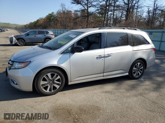 2014 Honda Odyssey Touring with VIN 5FNRL5H94EB094357, listed as a Copart auction lot 53930635 with 210,448 mi miles and Salvage Title. Bid and sale history available at carsss.com. Image 1.