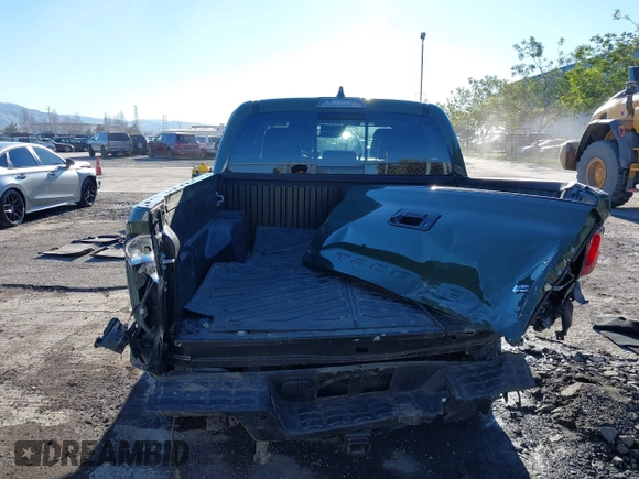 2021 Toyota Tacoma SR with VIN 3TMCZ5AN7MM395940, listed as a IAAI auction lot 41240832 with 39,338 mi miles and . Bid and sale history available at DreamBid. Image 16.