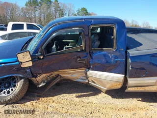 2000 Chevrolet Silverado 1500 LS with VIN 2GCEK19TXY1220801, listed as a IAAI auction lot 41812144 with 206,128 mi miles. Bid and sale history available at carsss.com. Image 14.