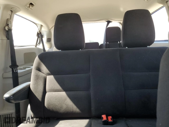2014 Dodge Grand Caravan American Value with VIN 2C4RDGBG2ER361449, listed as a Copart auction lot 54940615 with 85,012 mi miles and Salvage Title. Bid and sale history available at DreamBid. Image 10.