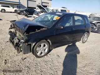 2007 Kia Spectra with VIN KNAFE162375006203, listed as a Copart auction lot 76739084 with 0 mi miles and Salvage Title. Bid and sale history available at carsss.com. Image 1.