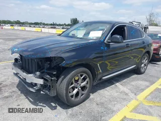 2024 BMW X4 xDrive30i z VIN 5UX33DT09R9W67695, wystawiony jako IAAI lot #42087562 z przebiegiem 20 324 mil mil oraz . Historia ofert i sprzedaży dostępna na DreamBid. Obrazek 18.