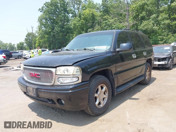 2002 GMC Yukon Denali z VIN 1GKEK63U82J189550, wystawiony jako IAAI lot #42416885 z przebiegiem 209 115 mil mil oraz . Historia ofert i sprzedaży dostępna na DreamBid. Obrazek 2.