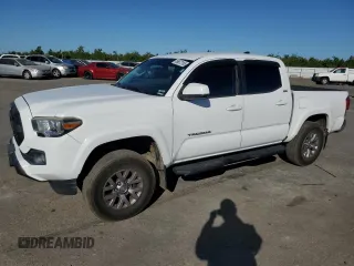 2017 Toyota Tacoma SR z VIN 5TFAX5GNXHX074690, wystawiony jako Copart lot #56672165 z przebiegiem 107 292 mil mil oraz Szkoda całkowita • Salvage title. Historia ofert i sprzedaży dostępna na DreamBid. Obrazek 1.