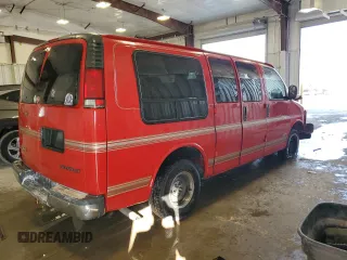2000 Chevrolet Chevy Van z VIN 1GBFG15M4Y1211137, wystawiony jako Copart lot #75990404 z przebiegiem 137 181 mil mil oraz Nie do naprawy • Non repairable. Historia ofert i sprzedaży dostępna na DreamBid. Obrazek 3.