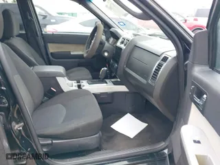 2010 Mercury Mariner with VIN 4M2CN8B75AKJ09335, listed as a IAAI auction lot 41279542 with 258,035 mi miles. Bid and sale history available at carsss.com. Image 5.