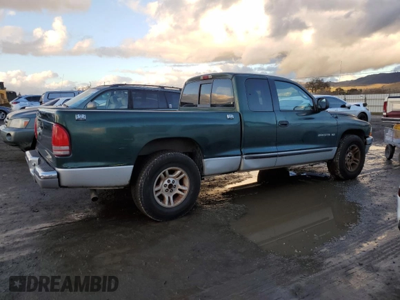 2001 Dodge Dakota z VIN 1B7GL22X51S315149, wystawiony jako Copart lot #41628735 z przebiegiem 295 276 mil mil oraz Czysty tytuł • Clean title. Historia ofert i sprzedaży dostępna na DreamBid. Obrazek 3.