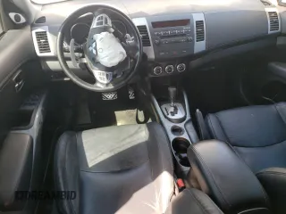 2011 Mitsubishi Outlander XLS z VIN JA4JS4AX4BU012496, wystawiony jako Copart lot #52871125 z przebiegiem 136 561 mil mil oraz Szkoda całkowita • Salvage title. Historia ofert i sprzedaży dostępna na DreamBid. Obrazek 8.