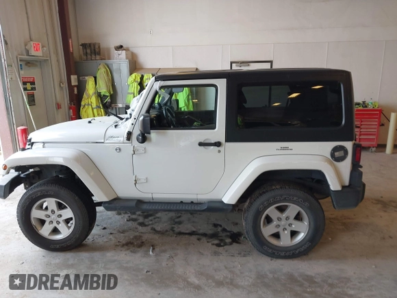 2015 Jeep Wrangler Sahara with VIN 1C4AJWBG7FL648621, listed as a IAAI auction lot 42439781 with 107,148 mi miles and . Bid and sale history available at DreamBid. Image 14.