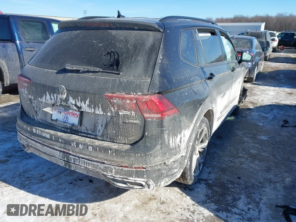 2024 Volkswagen Tiguan SE R-Line Black with VIN 3VV8B7AX3RM158006, listed as a IAAI auction lot 41416903 with 1,735 mi miles and . Bid and sale history available at DreamBid. Image 4.