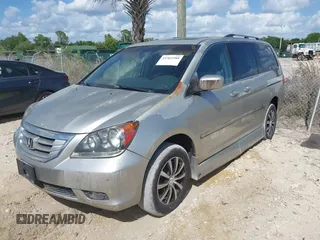 2008 Honda Odyssey Touring with VIN 5FNRL38898B056106, listed as a IAAI auction lot 41963288 with 146,960 mi miles. Bid and sale history available at carsss.com. Image 2.