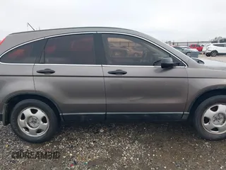 2010 Honda CR-V LX z VIN 5J6RE3H38AL000217, wystawiony jako IAAI lot #42051176 z przebiegiem 221 590 mil mil oraz . Historia ofert i sprzedaży dostępna na DreamBid. Obrazek 13.