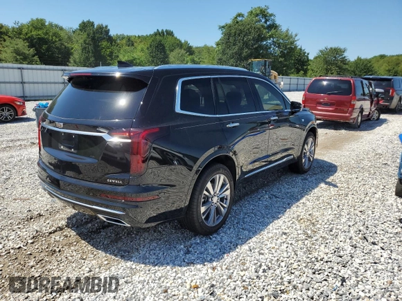 2023 Cadillac XT6 AWD Premium Luxury z VIN 1GYKPFRS2PZ162059, wystawiony jako Copart lot #63882963 z przebiegiem 6 567 mil mil oraz . Historia ofert i sprzedaży dostępna na DreamBid. Obrazek 3.