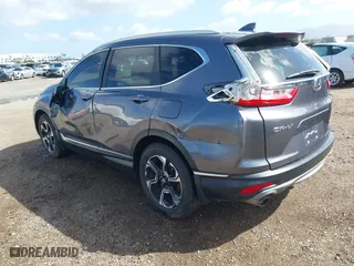 2019 Honda CR-V Touring with VIN 7FARW1H99KE005270, listed as a IAAI auction lot 41762812 with 122,583 mi miles. Bid and sale history available at carsss.com. Image 3.