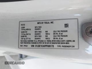 2023 Tesla Model 3 z VIN 5YJ3E1EAXPF606178, wystawiony jako IAAI lot #42543528 z przebiegiem 26 638 mil mil oraz . Historia ofert i sprzedaży dostępna na DreamBid. Obrazek 9.