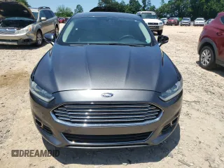 2016 Ford Fusion Titanium with VIN 3FA6P0K9XGR109499, listed as a Copart auction lot 61858445 with 192,272 mi miles and Clean title. Bid and sale history available at DreamBid. Image 5.