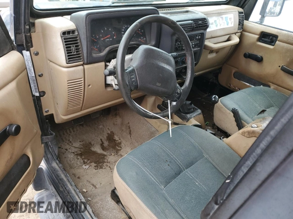 2002 Jeep Wrangler Sahara z VIN 1J4FA59S42P776905, wystawiony jako Copart lot #53373015 z przebiegiem 231 915 mil mil oraz Czysty tytuł • Clean title. Historia ofert i sprzedaży dostępna na DreamBid. Obrazek 8.