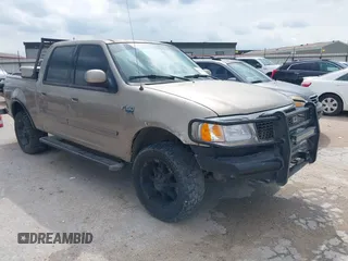 2003 Ford F-150 XLT with VIN 1FTRW08653KA87935, listed as a IAAI auction lot 42101353 with 1 mi miles. Bid and sale history available at carsss.com. Image 1.
