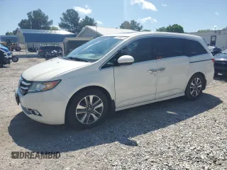 2016 Honda Odyssey Touring Elite с VIN 5FNRL5H96GB051187, выставлен на аукционе Copart как лот 55166475 с пробегом 156 232 миль миль и Списание • Salvage title. История ставок и продаж доступна на DreamBid. Изображение 1.