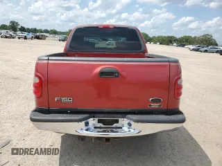 2001 Ford F-150 XLT with VIN 1FTRW076X1KC42302, listed as a Copart auction lot 59868295 with 234,772 mi miles and Salvage title. Bid and sale history available at DreamBid. Image 6.