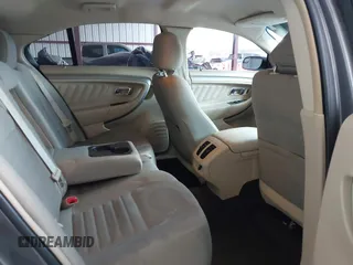 2014 Ford Taurus SE with VIN 1FAHP2D89EG136335, listed as a IAAI auction lot 41880655 with 211,635 mi miles. Bid and sale history available at carsss.com. Image 8.