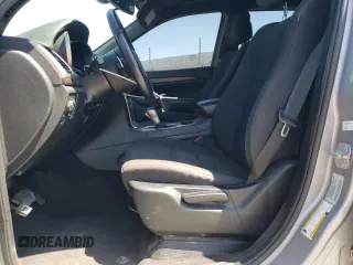 2016 Jeep Grand Cherokee Laredo with VIN 1C4RJEAGXGC358910, listed as a Copart auction lot 61499455 with 86,054 mi miles and Salvage title. Bid and sale history available at DreamBid. Image 7.