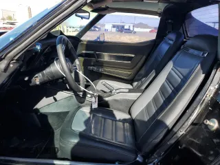 1977 Chevrolet Corvette with VIN 1Z37L7S412823, listed as a Copart auction lot 82405174 with 9,206 mi miles and Clean title. Bid and sale history available at DreamBid. Image 7.