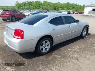 2010 Dodge Charger SXT with VIN 2B3CA3CV9AH311637, listed as a IAAI auction lot 42079657 with 187,683 mi miles. Bid and sale history available at carsss.com. Image 4.