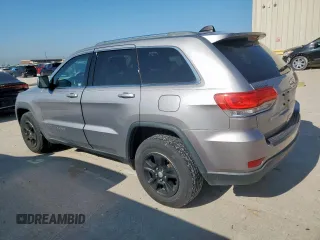 2014 Jeep Grand Cherokee Laredo with VIN 1C4RJEAG4EC182773, listed as a Copart auction lot 54085255 with 138,775 mi miles and Salvage Title. Bid and sale history available at DreamBid. Image 2.