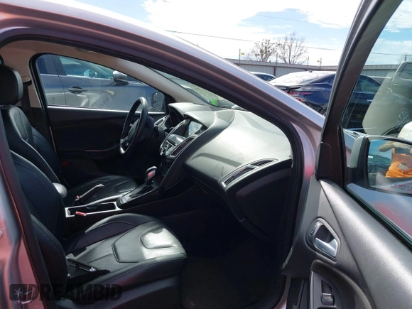 2017 Ford Focus Titanium with VIN 1FADP3N26HL309903, listed as a IAAI auction lot 41642306 with 107,762 mi miles and . Bid and sale history available at carsss.com. Image 5.