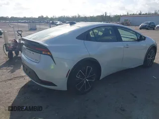 2024 Toyota Prius LE with VIN JTDACAAU1R3033846, listed as a IAAI auction lot 41704630 with 1,678 mi miles. Bid and sale history available at carsss.com. Image 4.