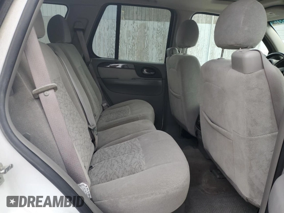 2007 GMC Envoy SLE z VIN 1GKDT13S272124785, wystawiony jako Copart lot #56509515 z przebiegiem 111 960 mil mil oraz Czysty tytuł • Clean title. Historia ofert i sprzedaży dostępna na DreamBid. Obrazek 11.