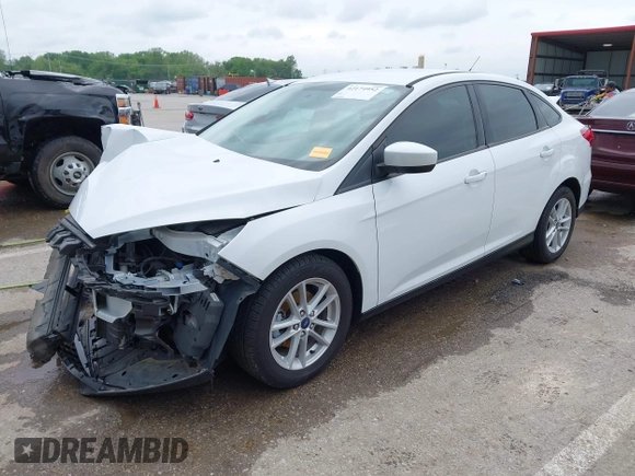 2018 Ford Focus SE z VIN 1FADP3F21JL257262, wystawiony jako IAAI lot #42174952 z przebiegiem 138 872 mil mil oraz . Historia ofert i sprzedaży dostępna na DreamBid. Obrazek 18.