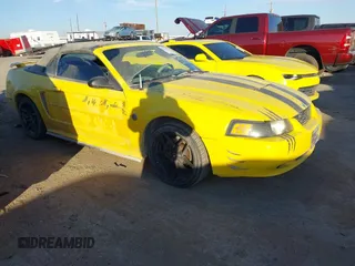 2004 Ford Mustang Deluxe with VIN 1FAFP44684F185726, listed as a IAAI auction lot 41291274 with 170,902 mi miles. Bid and sale history available at carsss.com. Image 1.