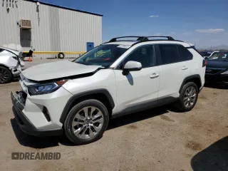 2021 Toyota RAV4 XLE Premium with VIN 2T3C1RFV0MW153089, listed as a Copart auction lot 60759615 with 28,153 mi miles and Salvage title. Bid and sale history available at DreamBid. Image 1.