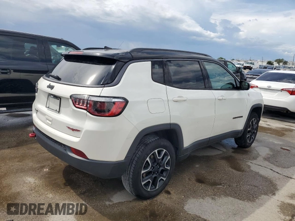 2019 Jeep Compass Trailhawk z VIN 3C4NJDDB5KT799401, wystawiony jako Copart lot #54770485 z przebiegiem 87 640 mil mil oraz Nie do naprawy • Non repairable. Historia ofert i sprzedaży dostępna na DreamBid. Obrazek 3.