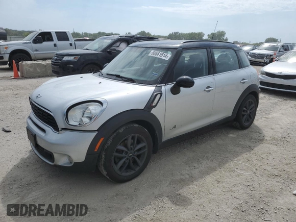 2014 MINI Countryman S with VIN WMWZC5C55EWM18087, listed as a Copart auction lot 68661614 with Not provided miles and Salvage title. Bid and sale history available at DreamBid. Image 1.