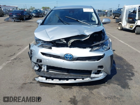 2021 Toyota Prius L Eco with VIN JTDKAMFUXM3144991, listed as a IAAI auction lot 42147025 with 106,466 mi miles and . Bid and sale history available at DreamBid. Image 11.