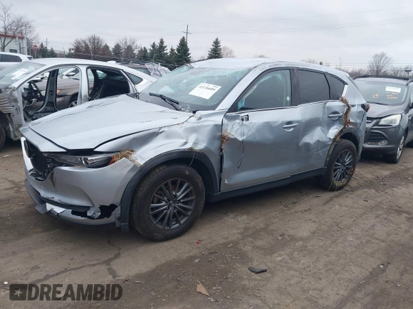 2021 Mazda CX-5 Touring with VIN JM3KFBCM7M0356685, listed as a IAAI auction lot 41136689 with 45,224 mi miles. Bid and sale history available at carsss.com. Image 2.