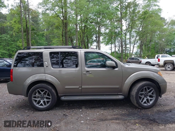 2005 Nissan Pathfinder SE z VIN 5N1AR18WX5C748572, wystawiony jako IAAI lot #42180475 z przebiegiem 291 301 mil mil oraz . Historia ofert i sprzedaży dostępna na DreamBid. Obrazek 13.